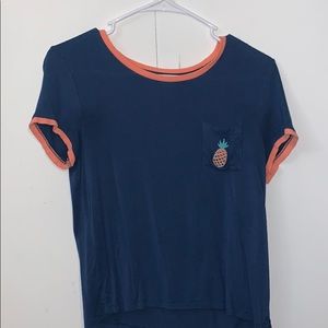 blue and pink pineapple shirt